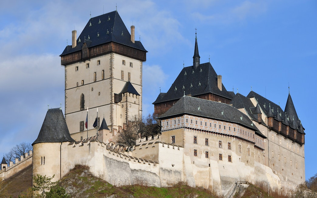 Karlštejn Castle's Marian Tower with surrounding walls in Czech Republic.