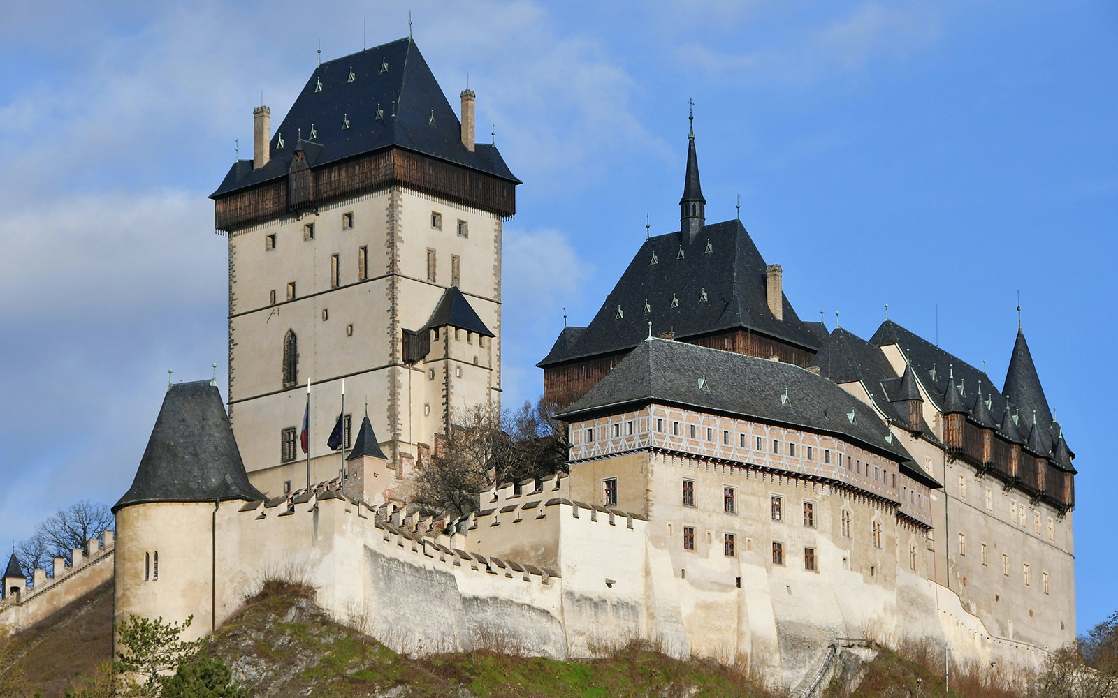 Karlštejn Castle's Marian Tower with surrounding walls in Czech Republic.