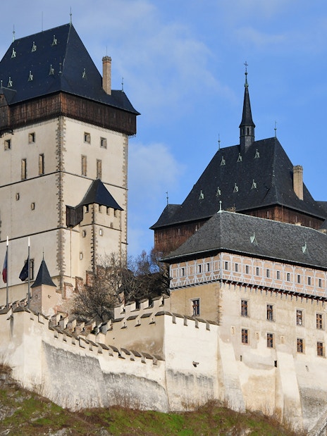 Karlštejn Castle's Marian Tower with surrounding walls in Czech Republic.