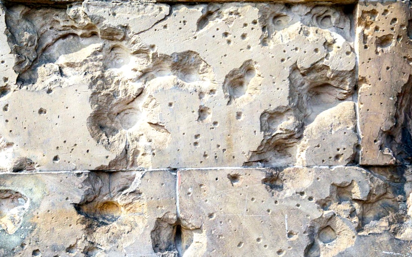 Wall with bullet holes from World War II, Berlin Third Reich Walking Tour.
