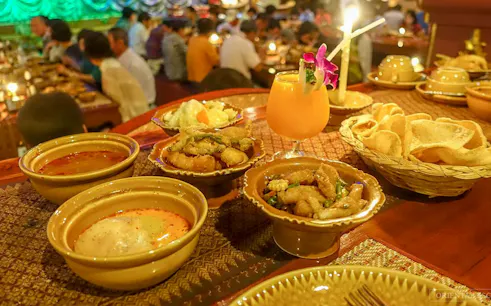 Nopparat Thai set dinner with dishes and drink, Bangkok dining experience.