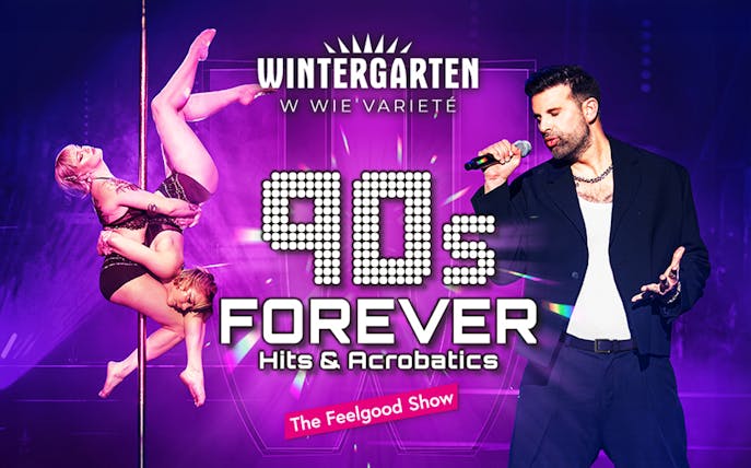 Acrobats performing with singer on stage for 90s Forever show.