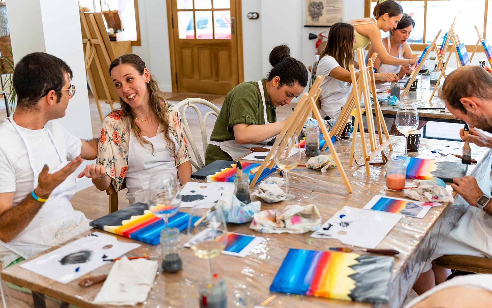 Painting workshop participants creating art in Singapore