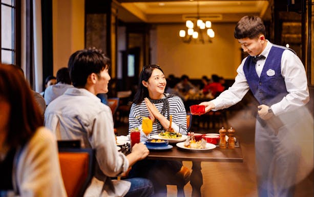Dining experience at Universal Studios Beijing restaurant during guided tour.