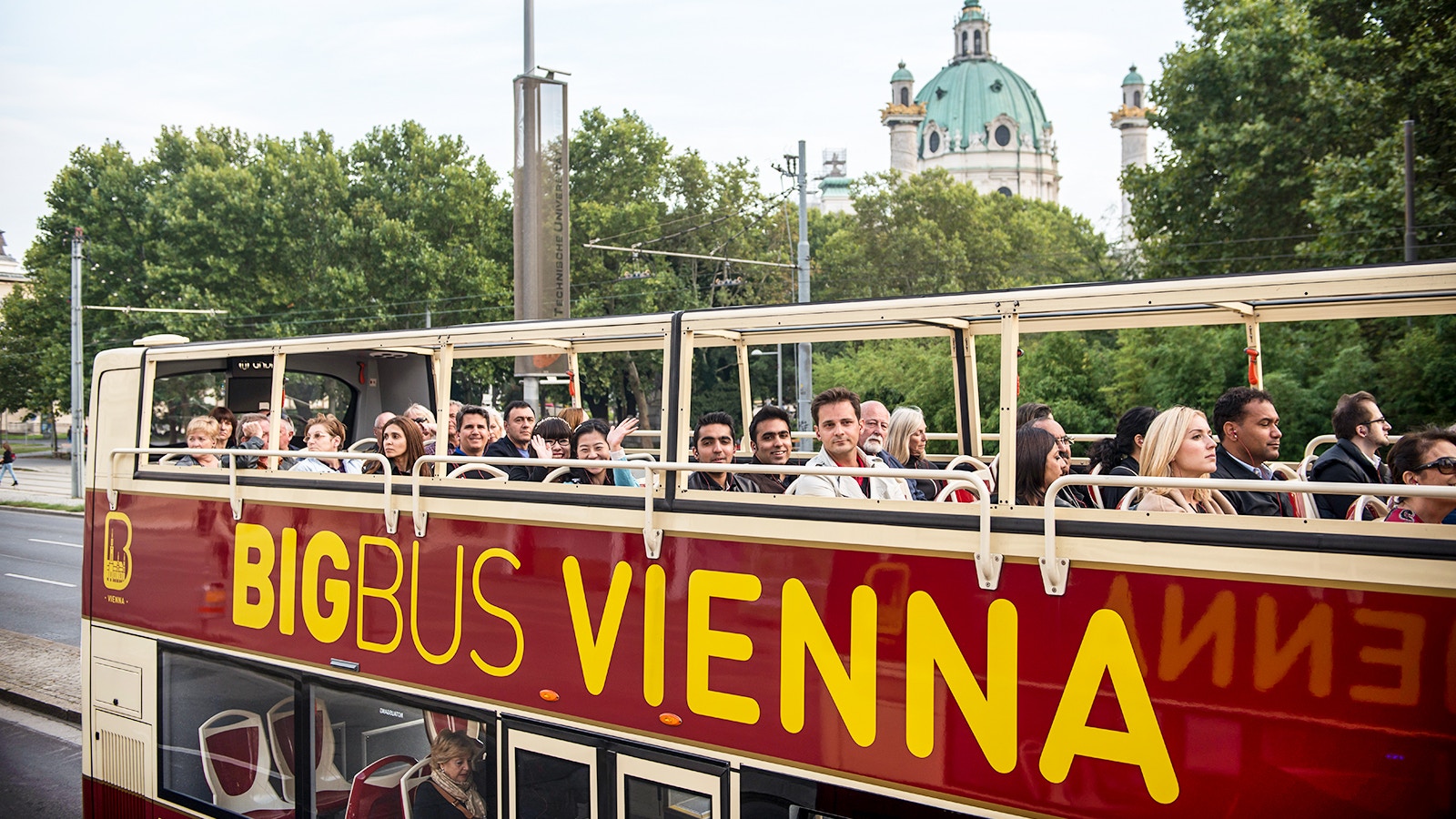 Vienna Big Bus Tour with view of historic buildings and city streets.