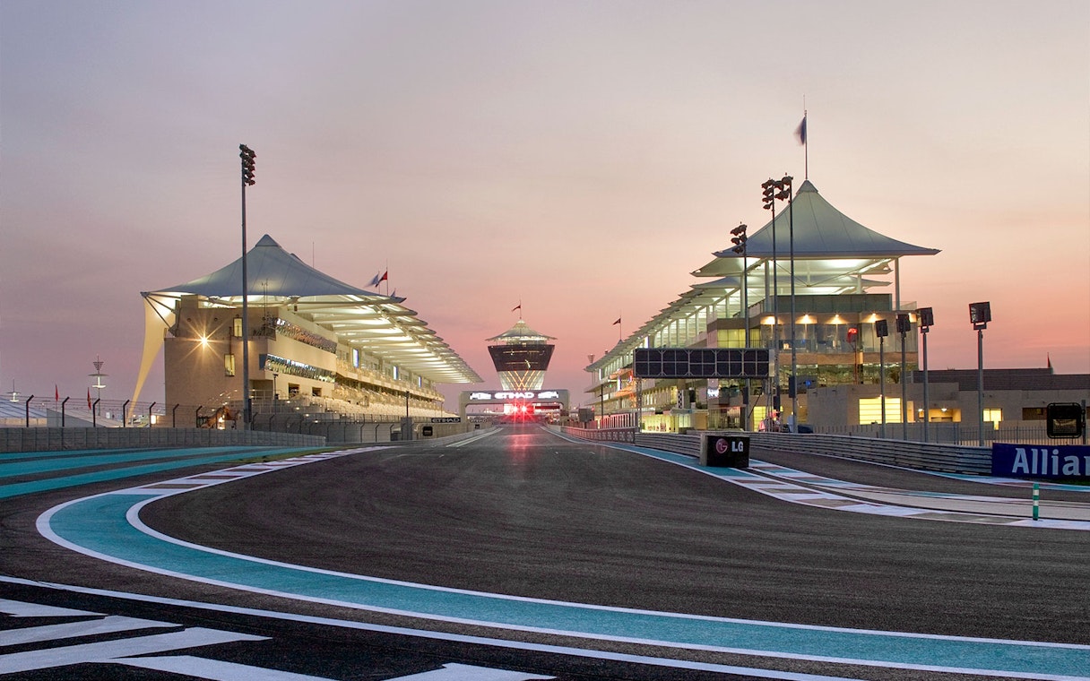 Yas Marina Circuit track view during guided venue tour at sunset.