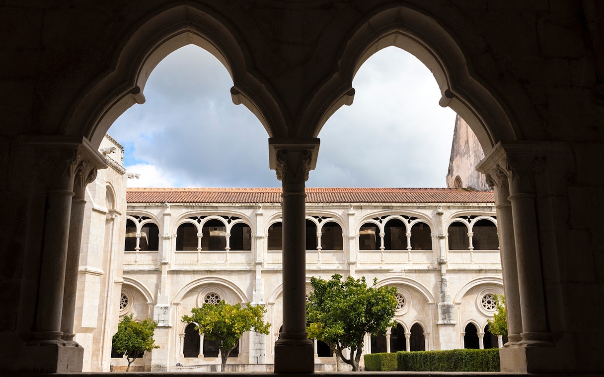 Cloister arches and courtyard at Alcobaça Monastery, Portugal.
