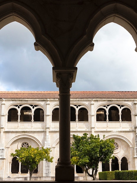 Cloister arches and courtyard at Alcobaça Monastery, Portugal.