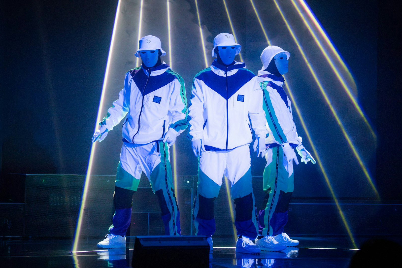 Dancers in white costumes performing at Jabbawockeez show, Las Vegas.