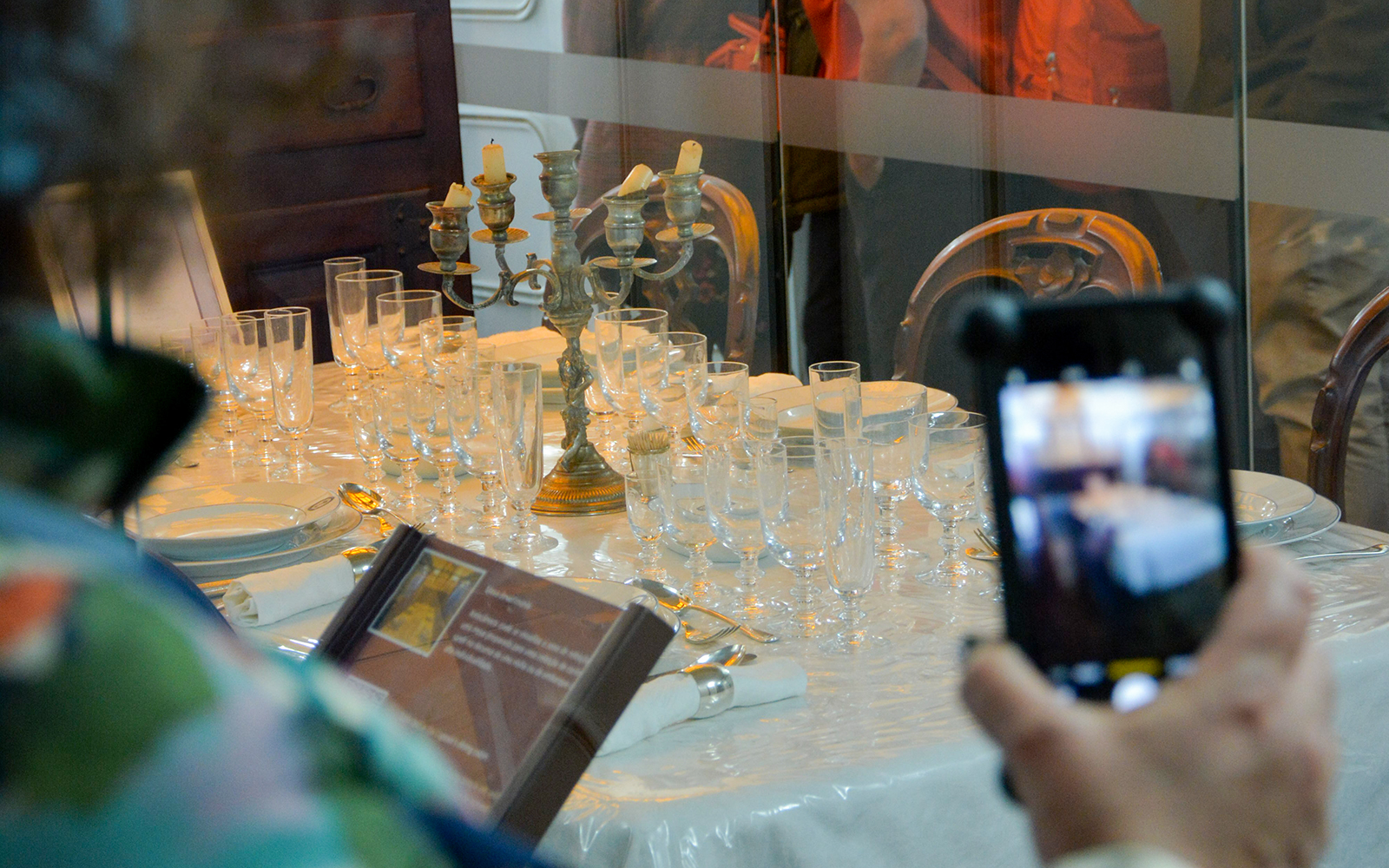 Dining table setup with glassware and candelabra on Frigate D. Fernando II e Glória.