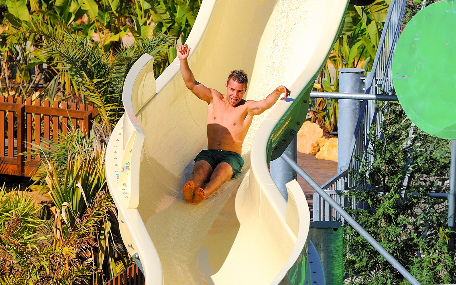 Guest sliding down water slide at Zoomarine Algarve, Portugal.