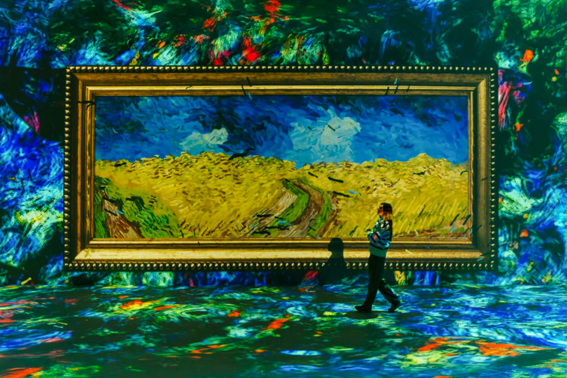Interactive Van Gogh exhibit in Madeira, featuring "Wheatfield with Crows" painting.