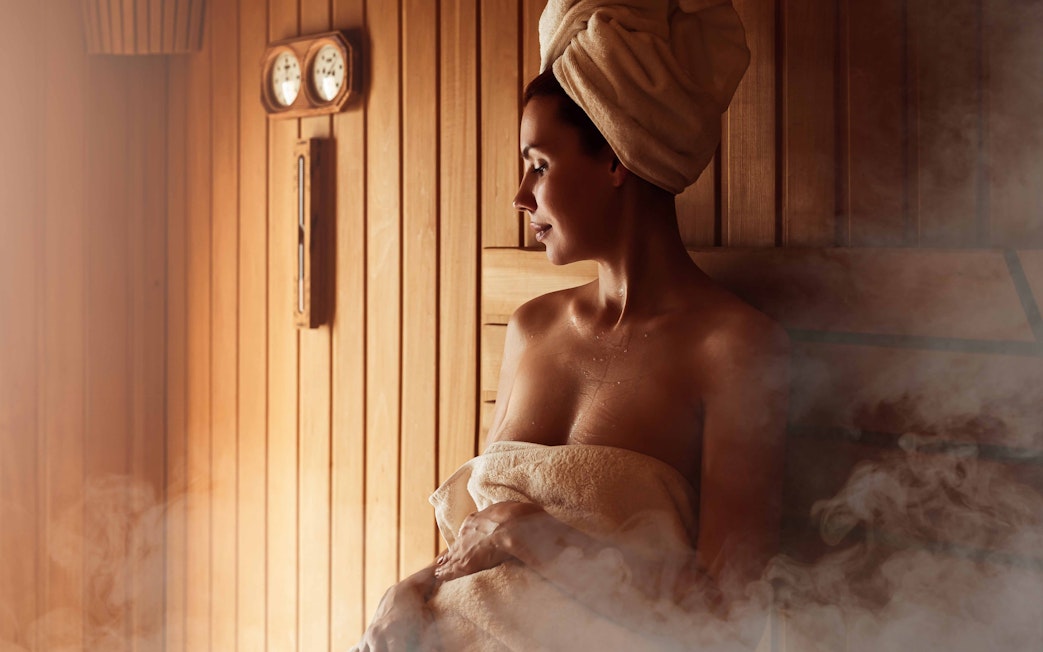 Person relaxing in a sauna at Szechenyi Thermal Spa, Budapest.
