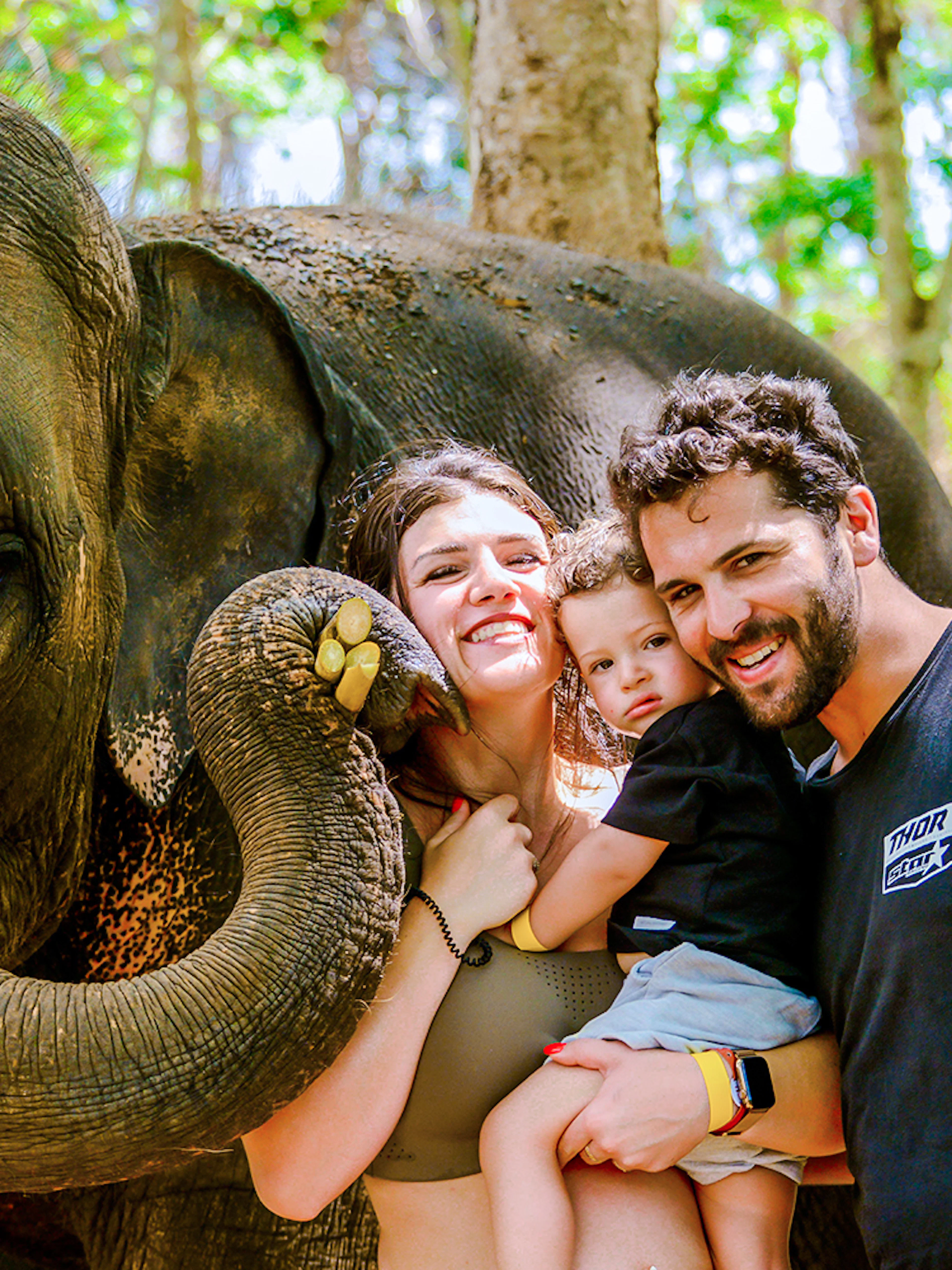 Family with elephant at Lily Elephant Camp, Phuket.