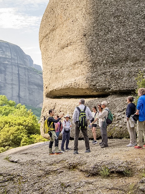 Guests hiking near rock formations during Meteora Hiking Tour with Monastery Visit.