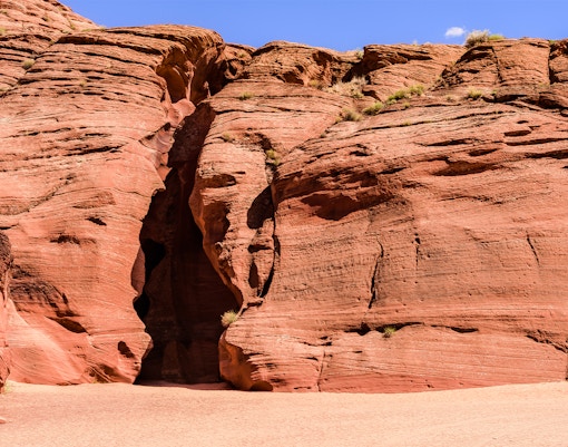 Entrance to Upper Antelope Canyon with red sandstone formations.