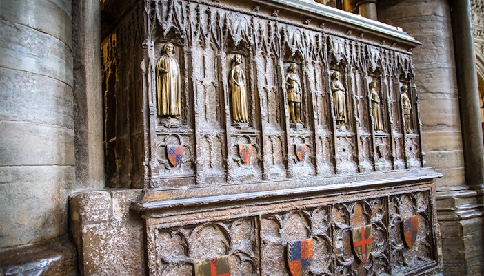 Stone carvings and shields inside Westminster Abbey, London.