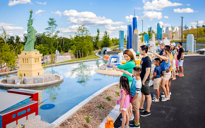 Guests viewing Lego Statue of Liberty at Legoland New York.