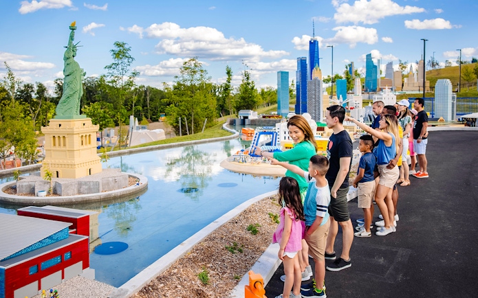 Guests viewing Lego Statue of Liberty at Legoland New York.