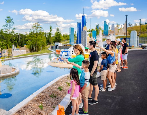Guests viewing Lego Statue of Liberty at Legoland New York.