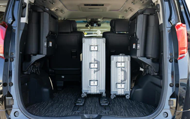 Luggage in the trunk of a vehicle for Tokyo private transfer service.