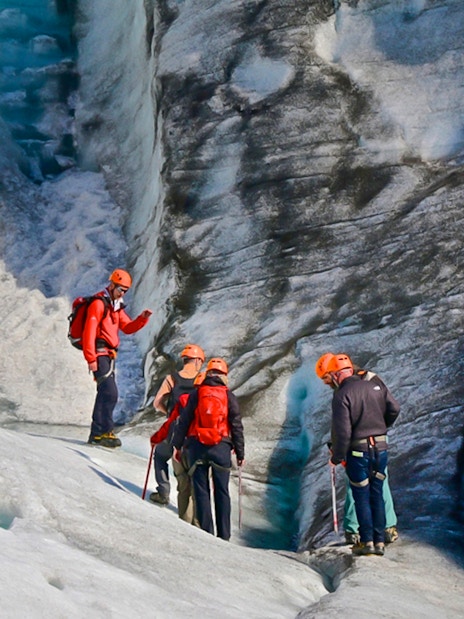 Guests hiking and ice climbing on a glacier in Skaftafell, Iceland.