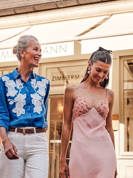 Couple shopping at La Vallée Village, Paris, France.