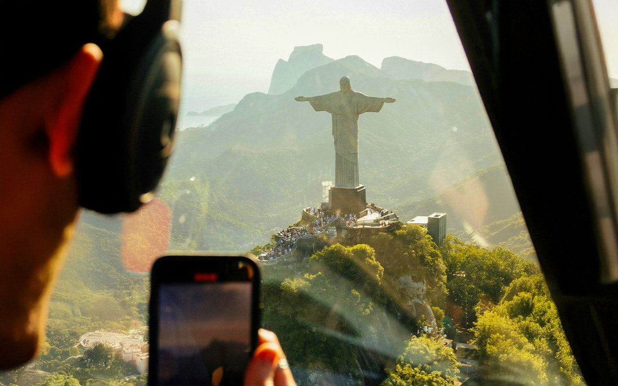 Helicopter view of Christ the Redeemer statue in Rio de Janeiro.