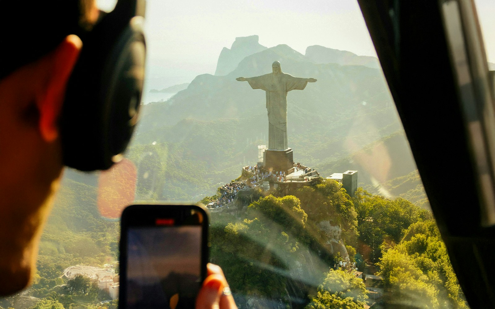 Helicopter view of Christ the Redeemer statue in Rio de Janeiro.