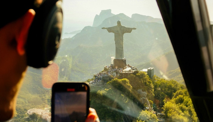 Helicopter view of Christ the Redeemer statue in Rio de Janeiro.