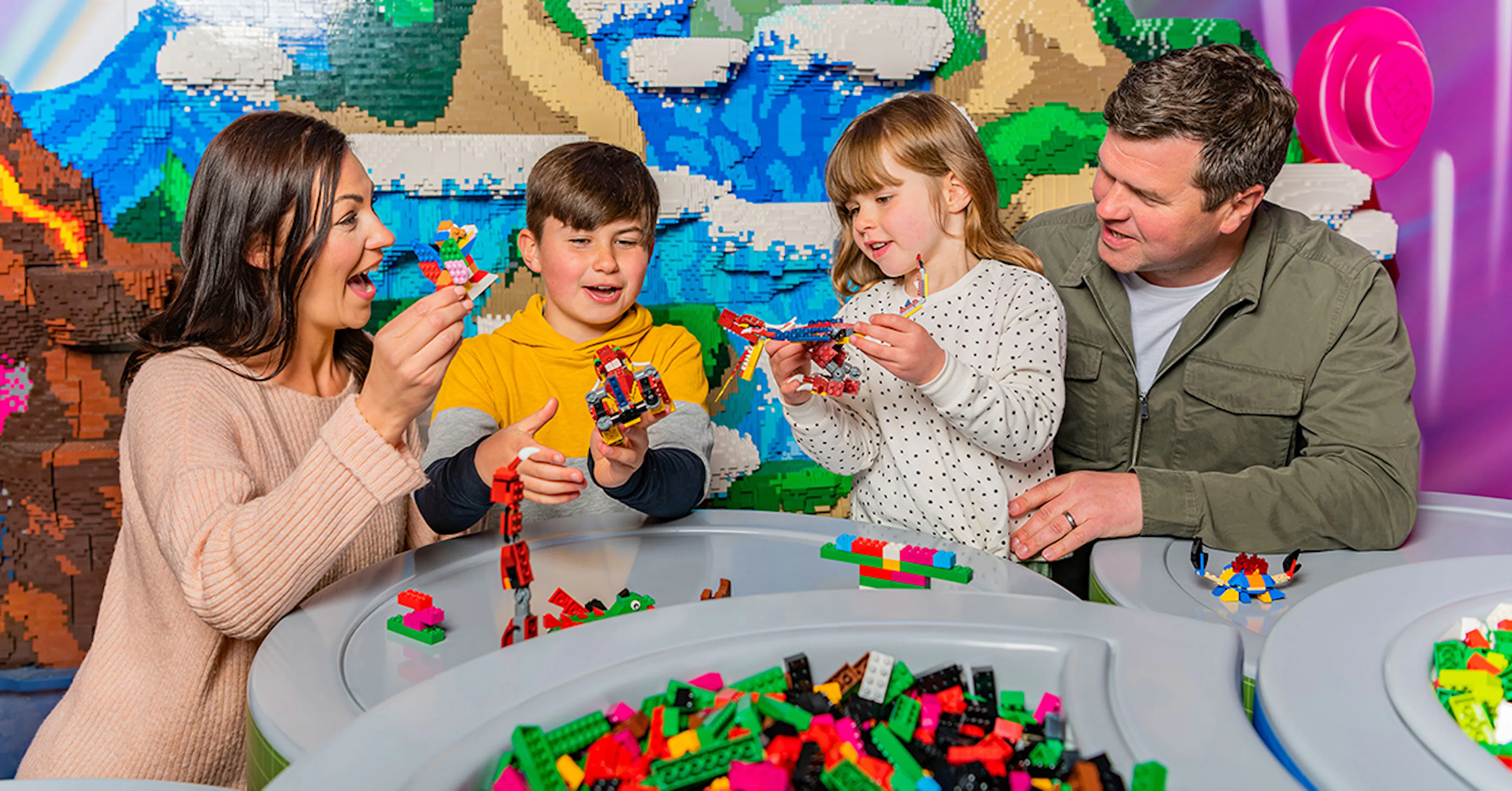 Guests building with LEGO bricks at Legoland Windsor.
