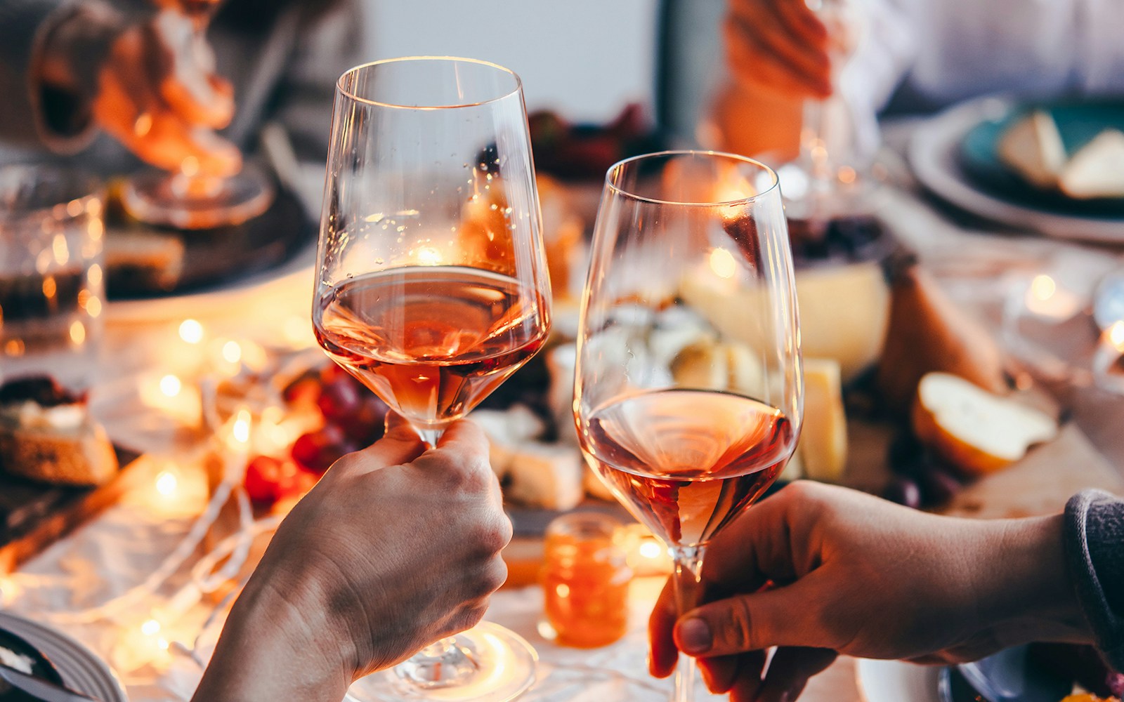 Clinking wine glasses