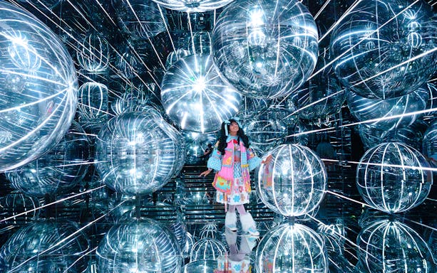 Visitors engaging with digital displays at House of Hype, New York City.