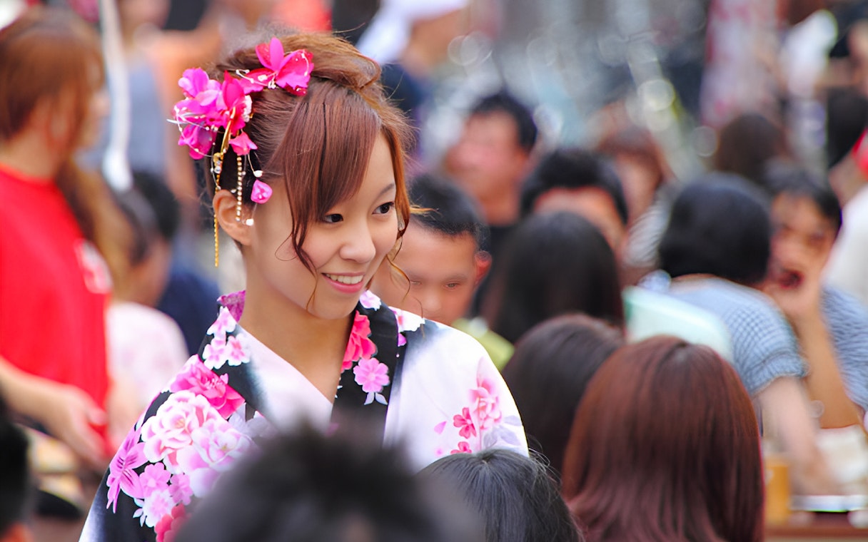 Person in floral kimono at Asakusa, Tokyo during full day rental experience.