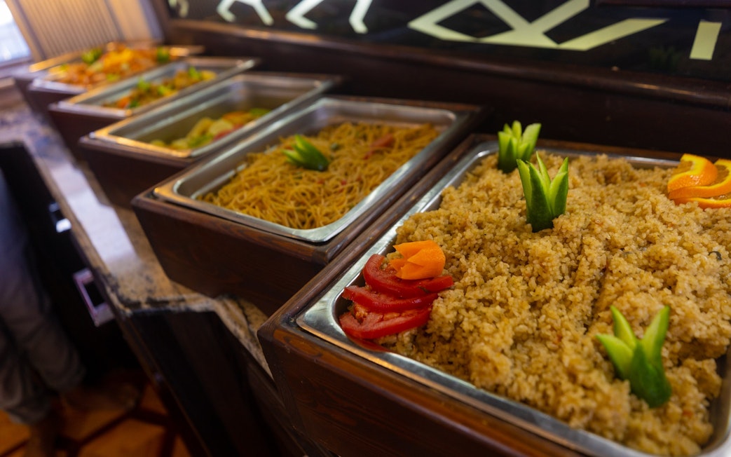 Buffet with rice and noodles on yacht, Orange Bay Island, Hurghada.