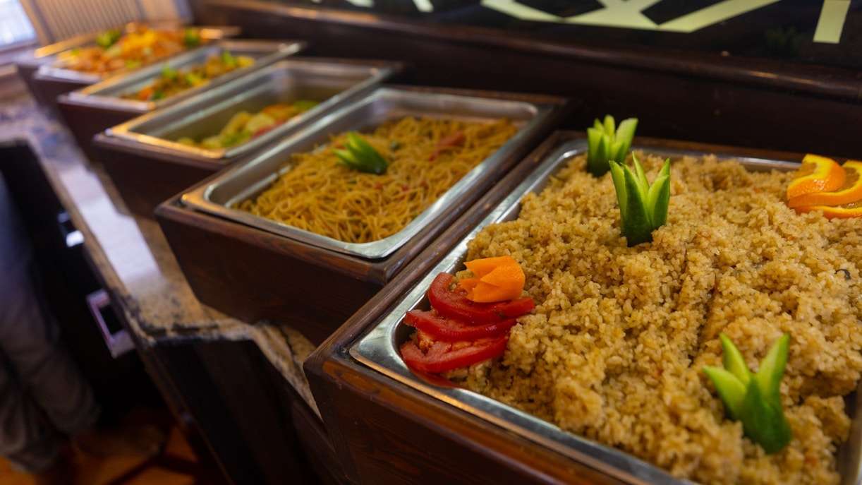 Buffet with rice and noodles on yacht, Orange Bay Island, Hurghada.