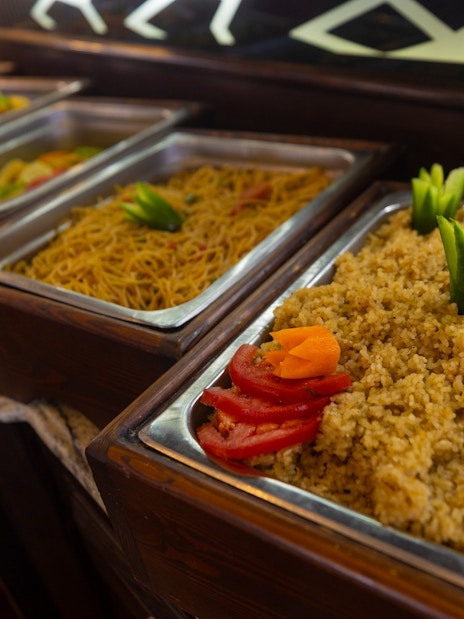 Buffet with rice and noodles on yacht, Orange Bay Island, Hurghada.