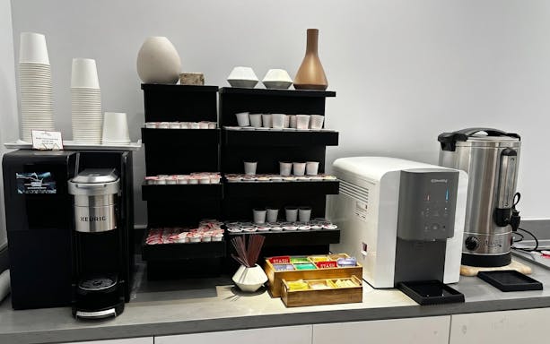 Coffee and tea station at HelloSky Lounge, JFK Terminal 4, New York.
