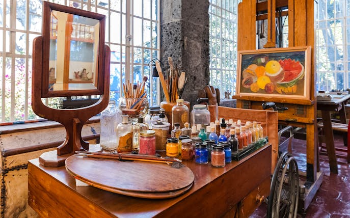 Art supplies and easel inside Frida Kahlo Museum, Mexico City.