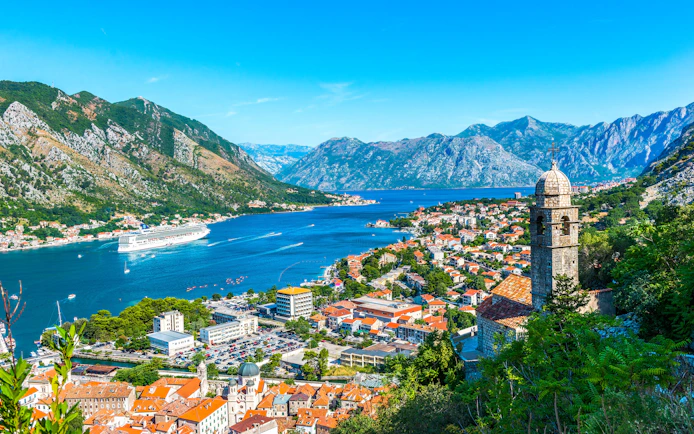 Kotor Bay in Montenegro with cruise ship and historic town view.