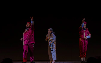 Performers in vibrant costumes on stage at Rio Scenarium, Rio de Janeiro.