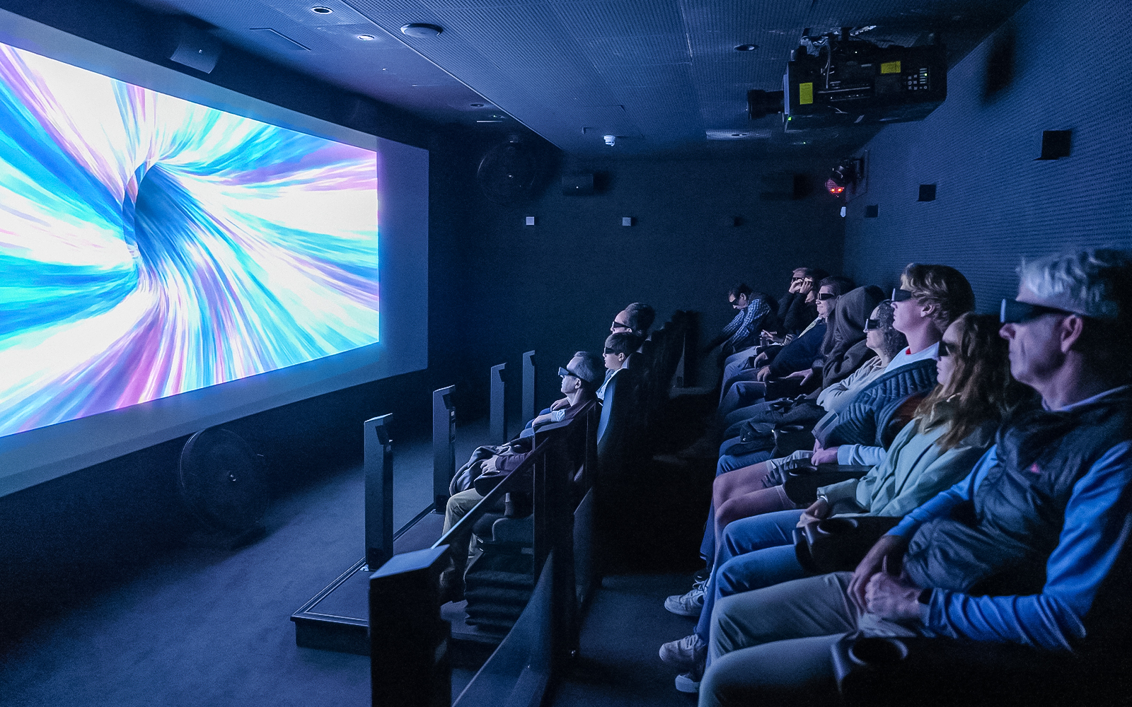 Football memorabilia display at Legends: The Home of Football Museum, Manchester, showcasing historic jerseys and trophies.