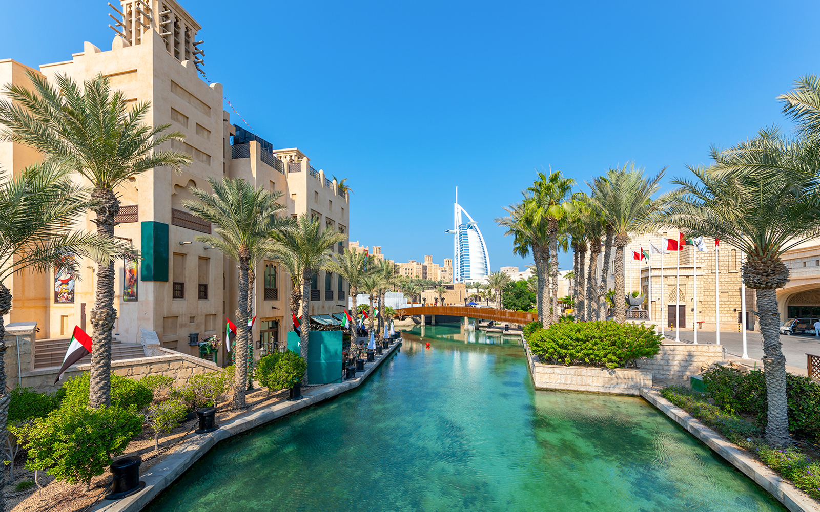 Souk Madinat Jumeirah Dubai with traditional Arabian architecture and water canals.