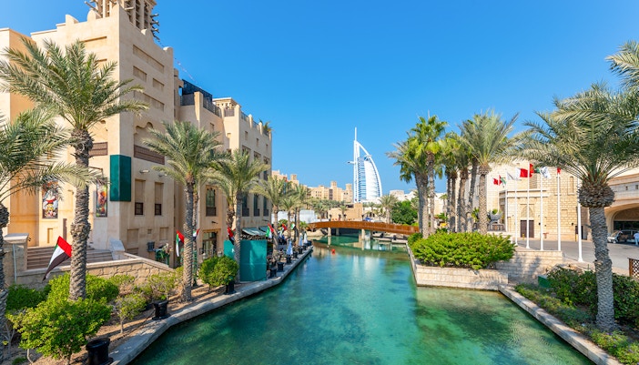 Souk Madinat Jumeirah Dubai with traditional Arabian architecture and water canals.