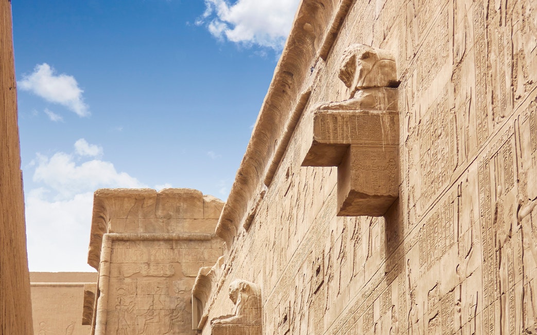 Temple of Horus at Edfu with detailed hieroglyphics and stone carvings.