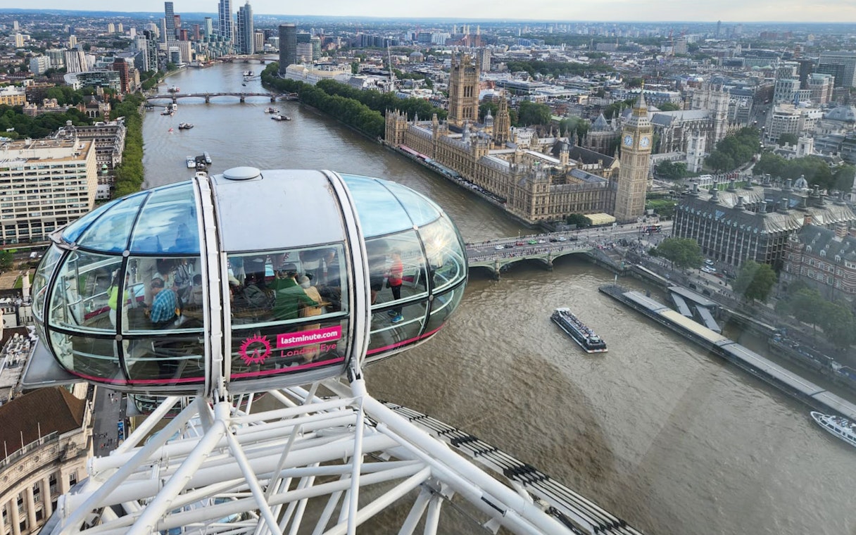 London Eye capsule overlooking the Thames and Houses of Parliament.