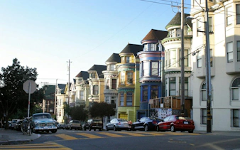Colorful Victorian houses on a street in Haight Ashbury, San Francisco.