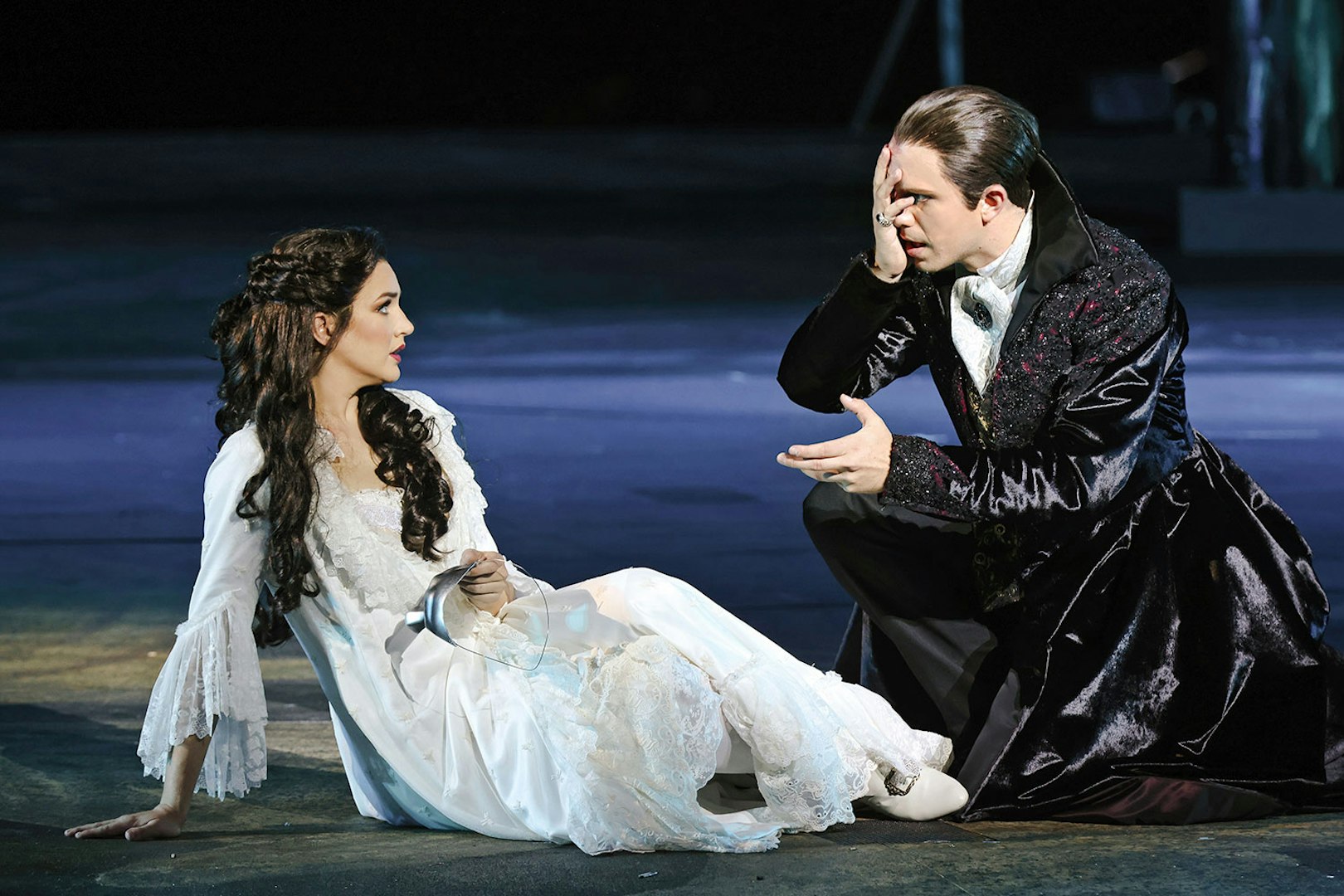 Actors performing The Phantom of the Opera on Sydney Harbour stage.
