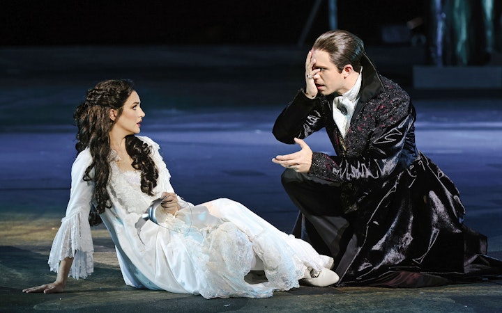 Actors performing The Phantom of the Opera on Sydney Harbour stage.