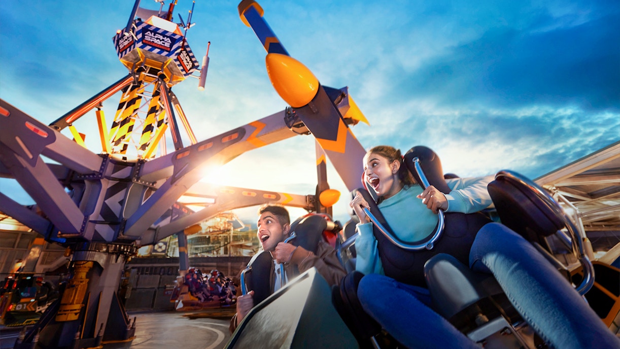 People enjoying a thrilling ride at Genting SkyWorld Outdoor Theme Park.